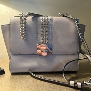 Michael Kors crossbody with two straps for hand carry if desired